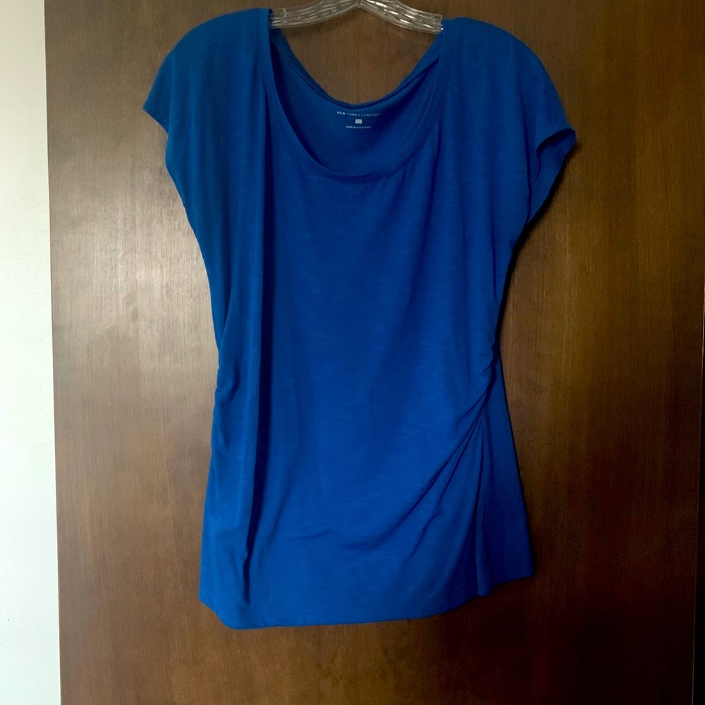 Blue top Could also be a maternity top